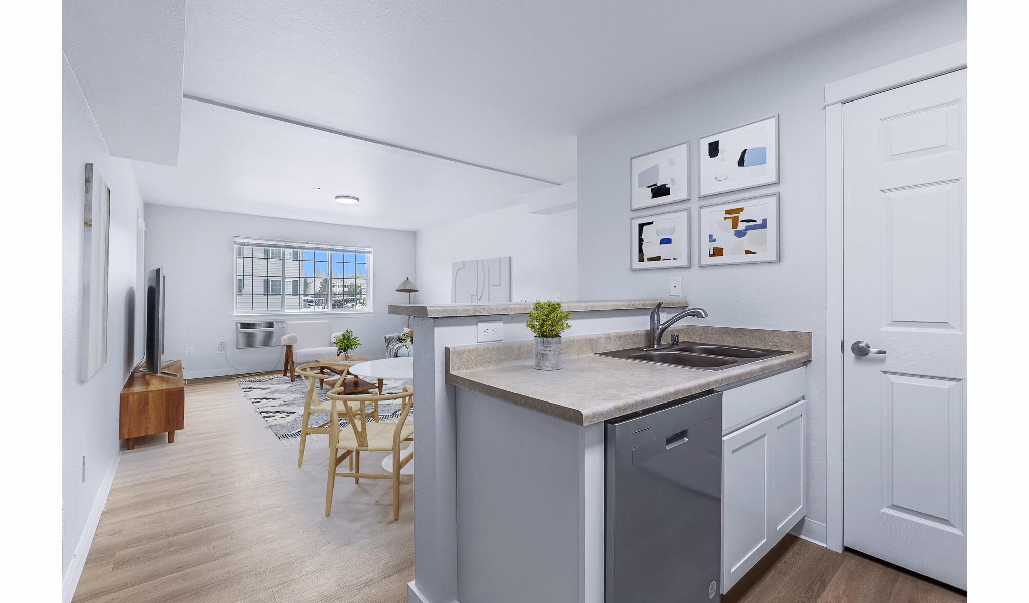 Spacious kitchen featuring stainless steel appliances at Trillium Apartments