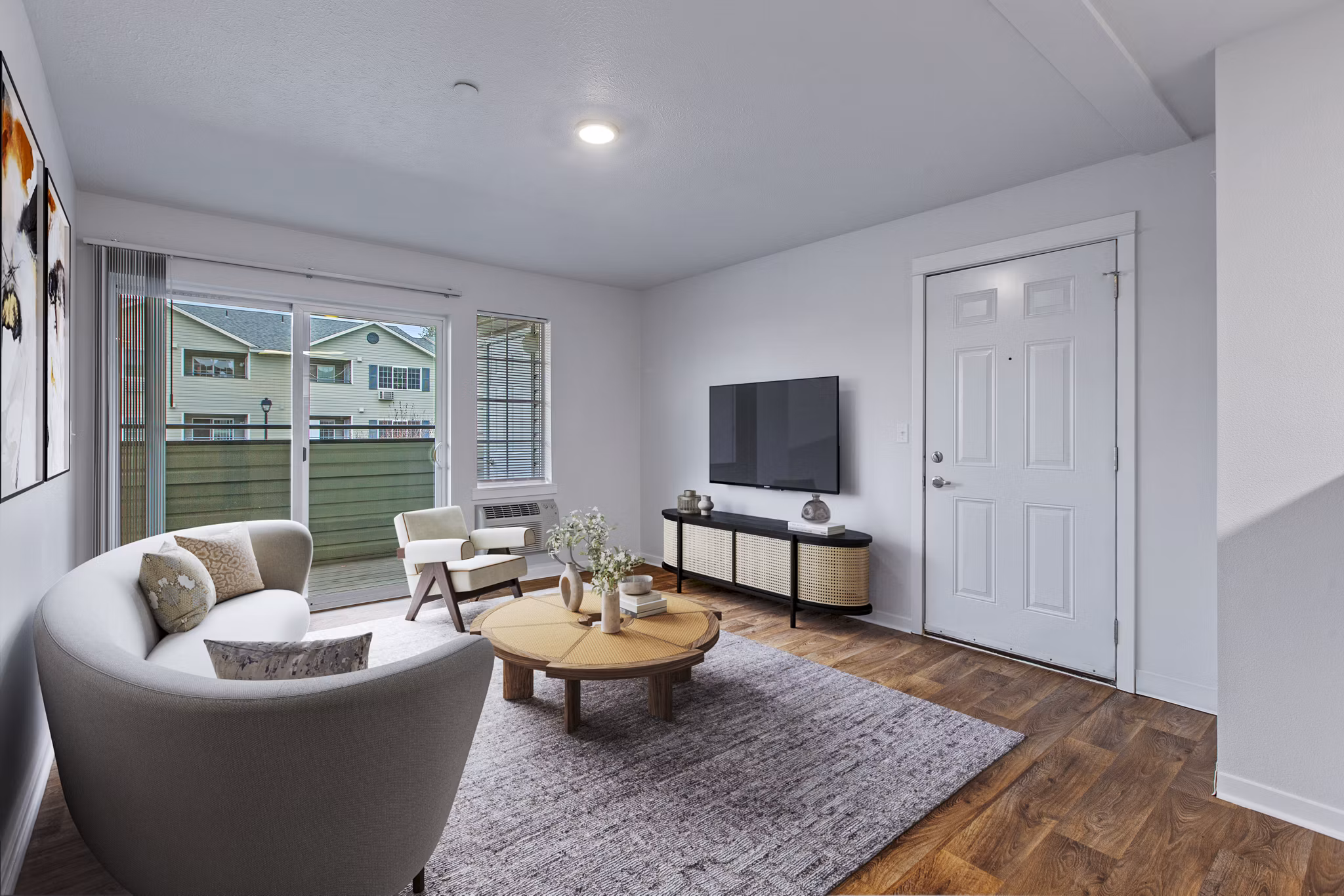 Modern living room with chic furnishings at Trillium Apartments, showcasing luxury and comfort in a stylish setting