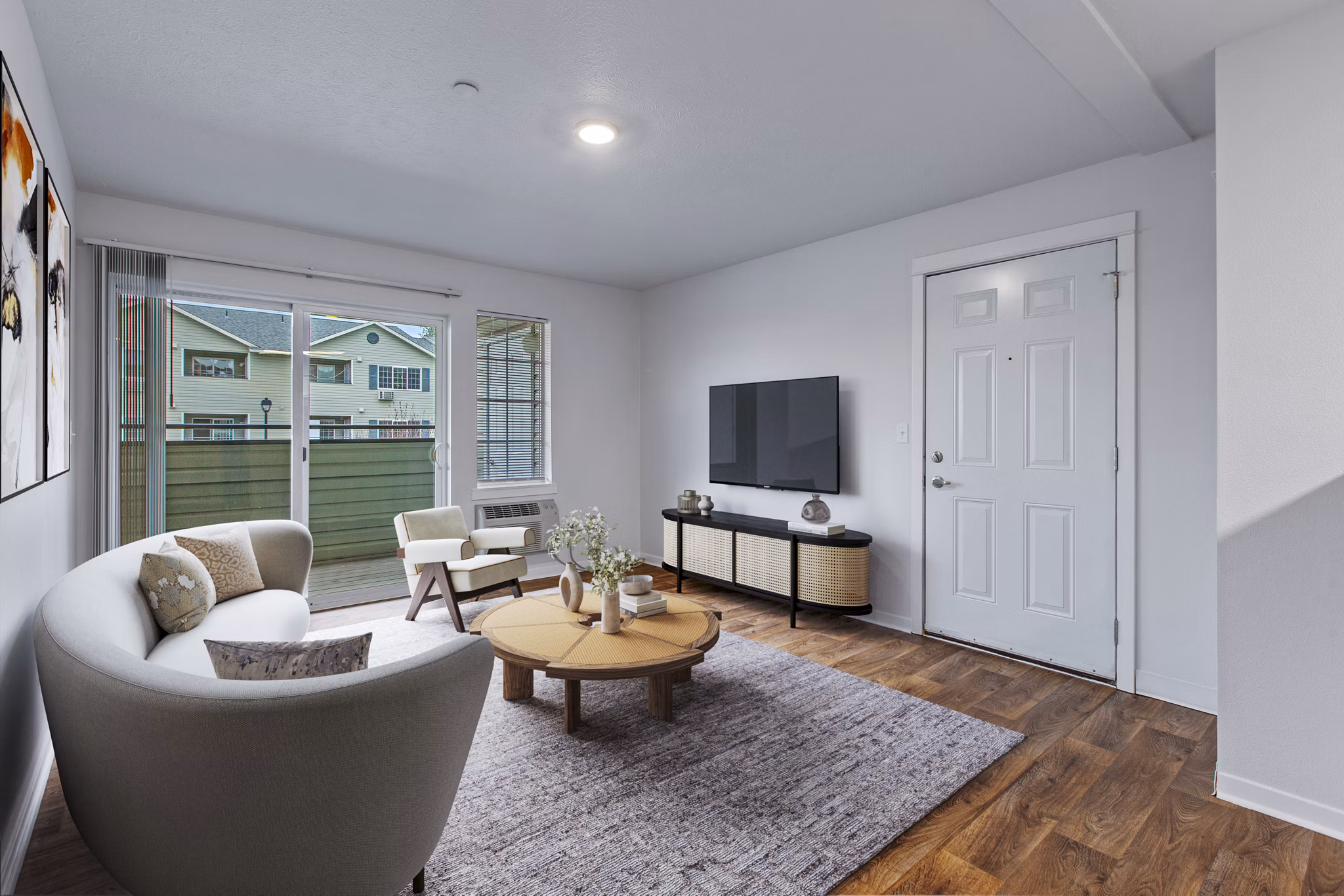 Modern living room with chic furnishings at Trillium Apartments, showcasing luxury and comfort in a stylish setting