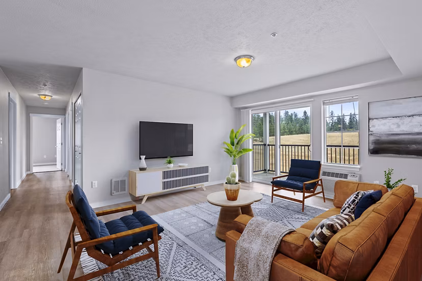 Living room with modern decor and vibrant accents in Trillium Apartments