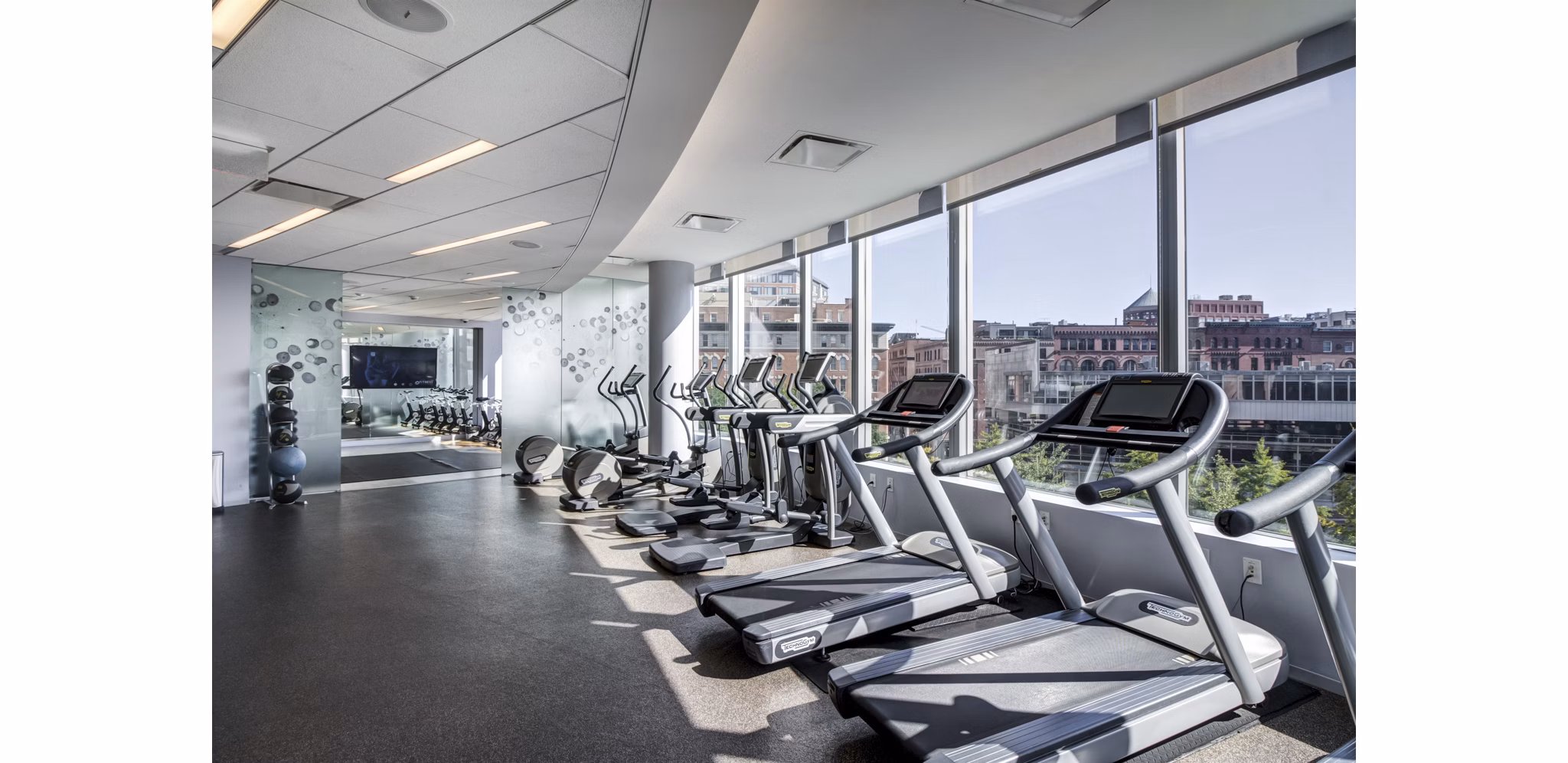 Modern fitness center with state-of-the-art equipment at Radian Apartments luxury living community