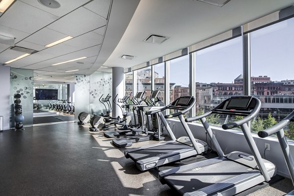 Modern fitness center with state-of-the-art equipment at Radian Apartments luxury living community