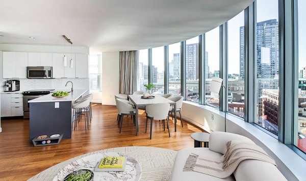 Spacious living room with contemporary design elements in Radian Apartments
