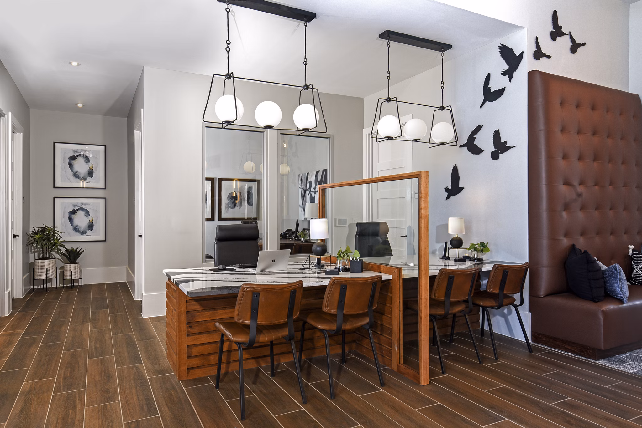 Clubhouse featuring modern decor and spacious seating at Austin Avenue Apartments