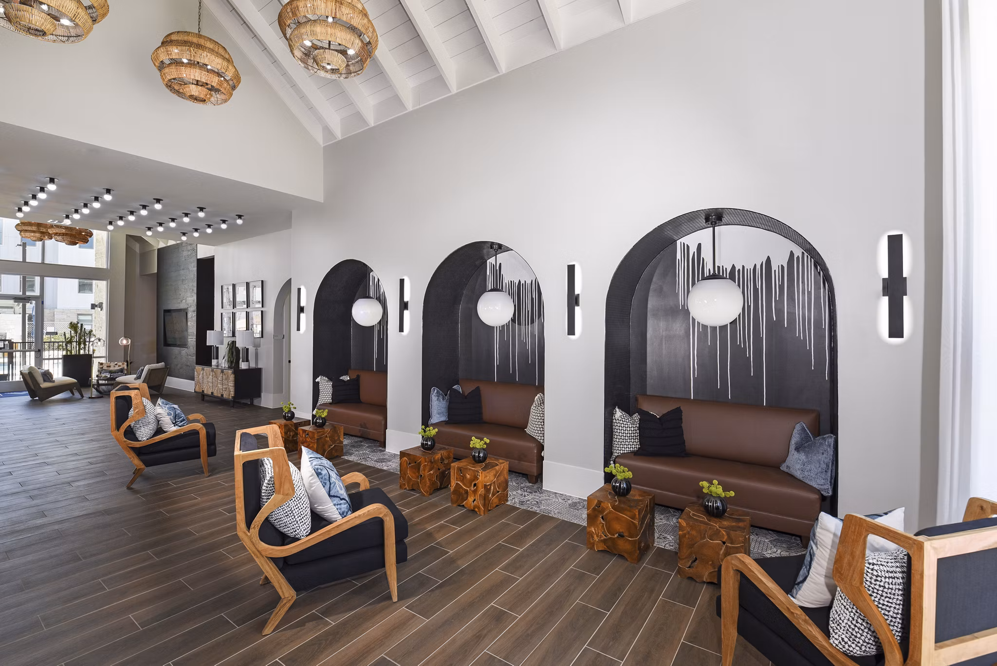 Clubhouse featuring modern design and cozy seating at Austin Avenue Apartments luxury complex