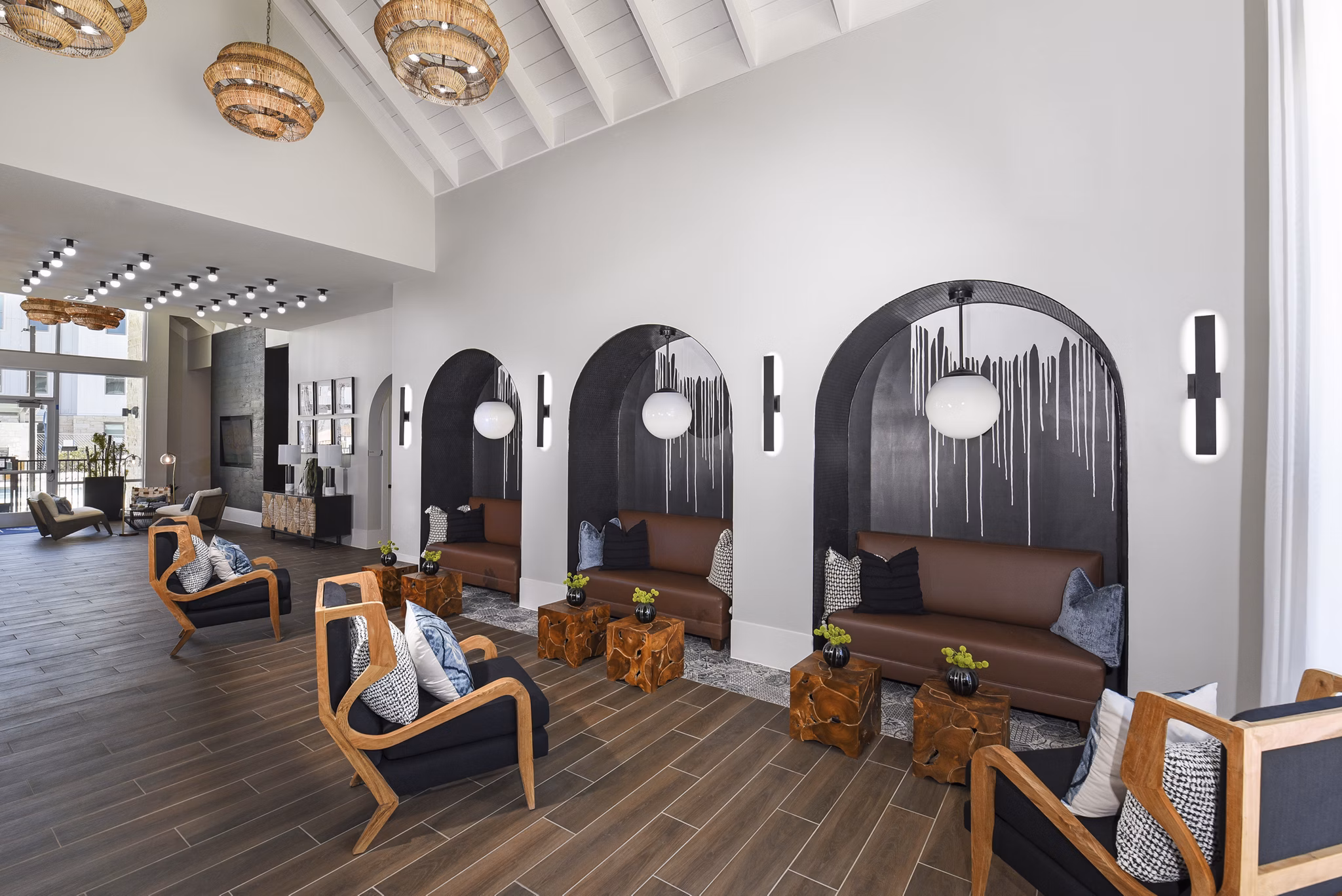 Clubhouse featuring modern design and cozy seating at Austin Avenue Apartments luxury complex