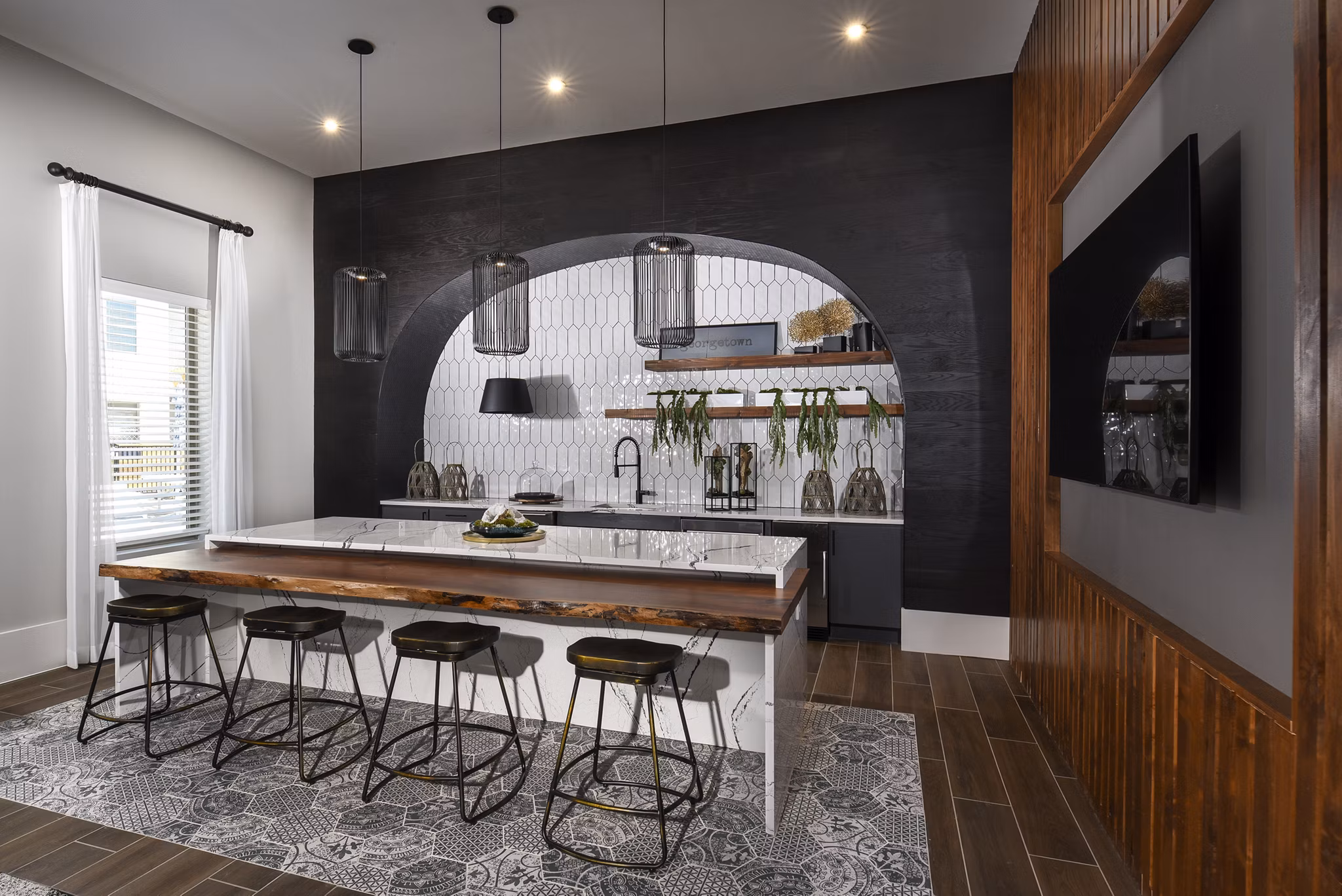 Clubhouse with modern dÃ©cor and seating at Austin Avenue Apartments: ideal for social gatherings and community events