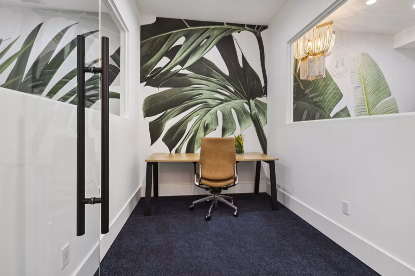 Business center with modern workstations at The Banks at Rivergate Apartments