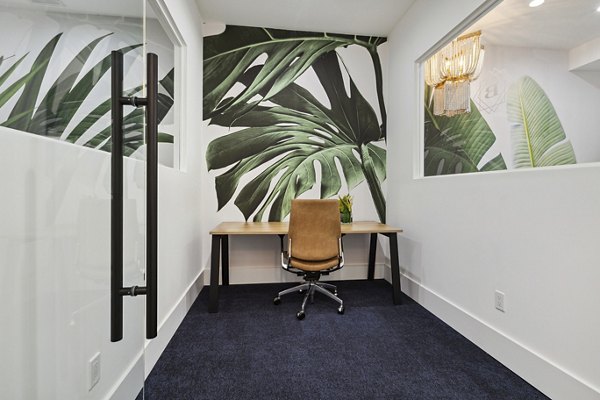 Business center with modern workstations at The Banks at Rivergate Apartments