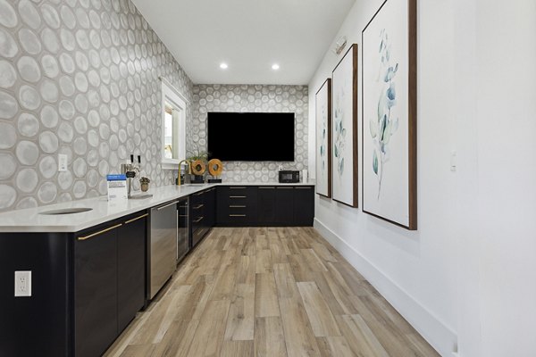 Clubhouse featuring modern design and community spaces at The Banks at Rivergate Apartments
