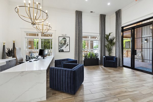 Clubhouse at The Banks at Rivergate Apartments offering luxury communal space with modern furnishings and entertainment options