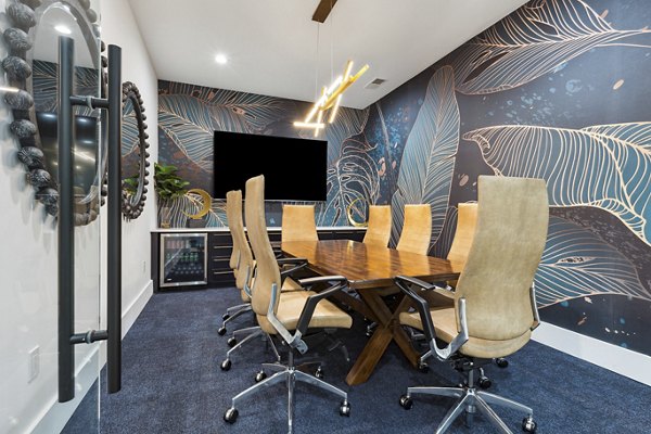 Meeting room with modern decor at The Banks at Rivergate Apartments, ideal for business gatherings and events in a luxury setting