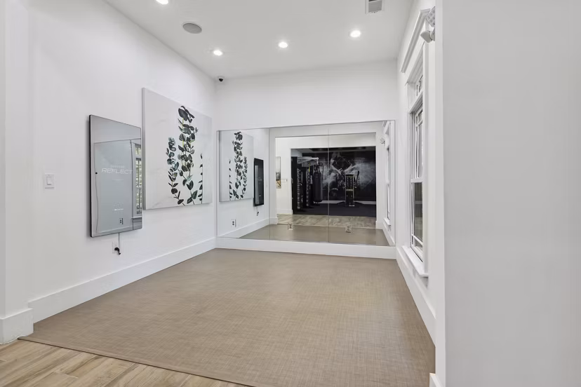 Yoga/spin studio with modern equipment at The Banks at Rivergate Apartments, premium fitness facility in Charlotte