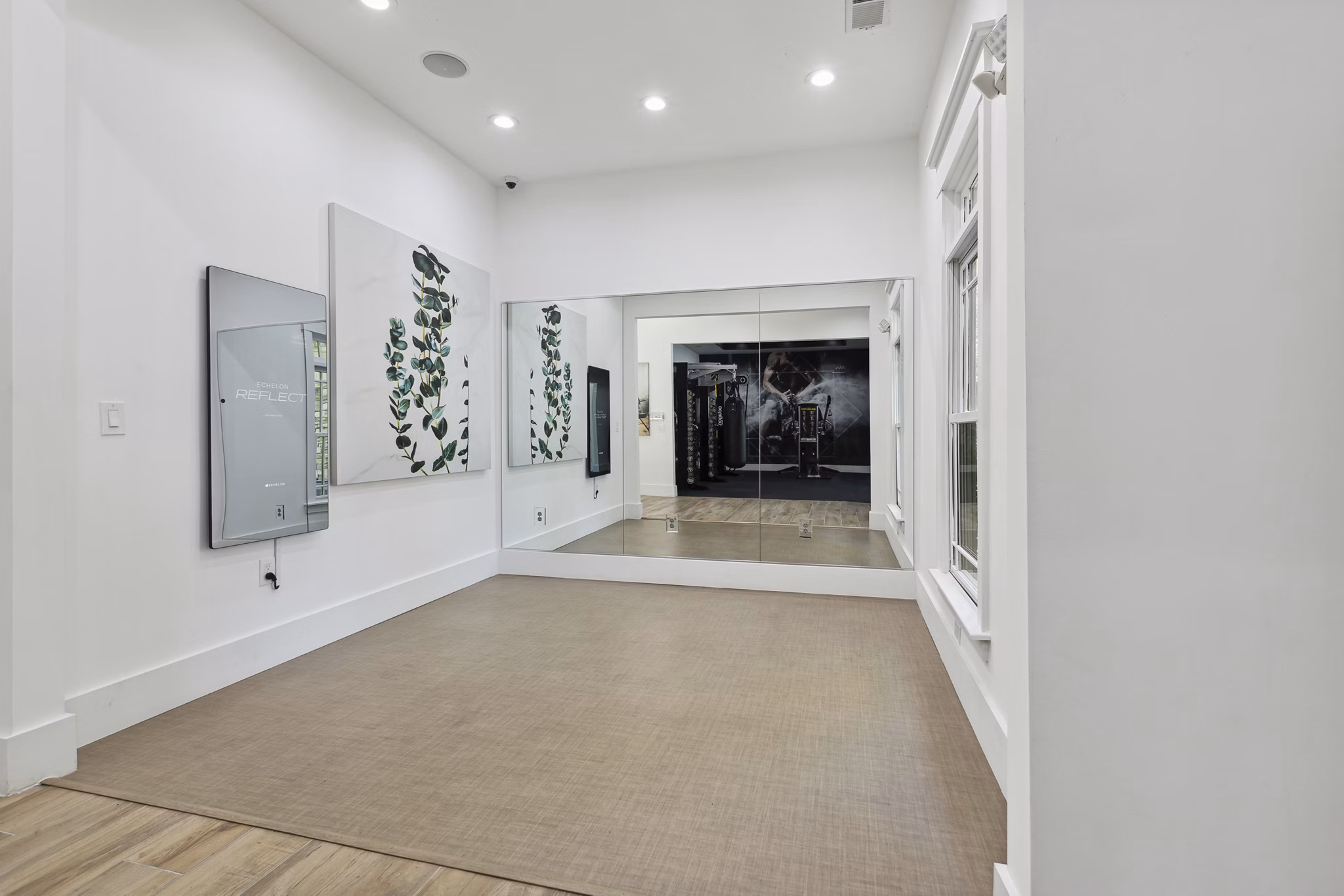 Yoga/spin studio with modern equipment at The Banks at Rivergate Apartments, premium fitness facility in Charlotte