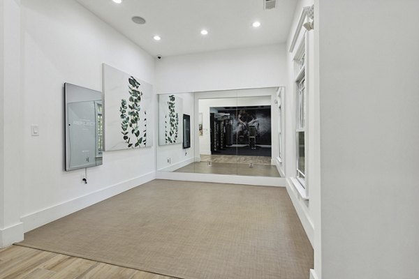 Yoga/spin studio with modern equipment at The Banks at Rivergate Apartments, premium fitness facility in Charlotte