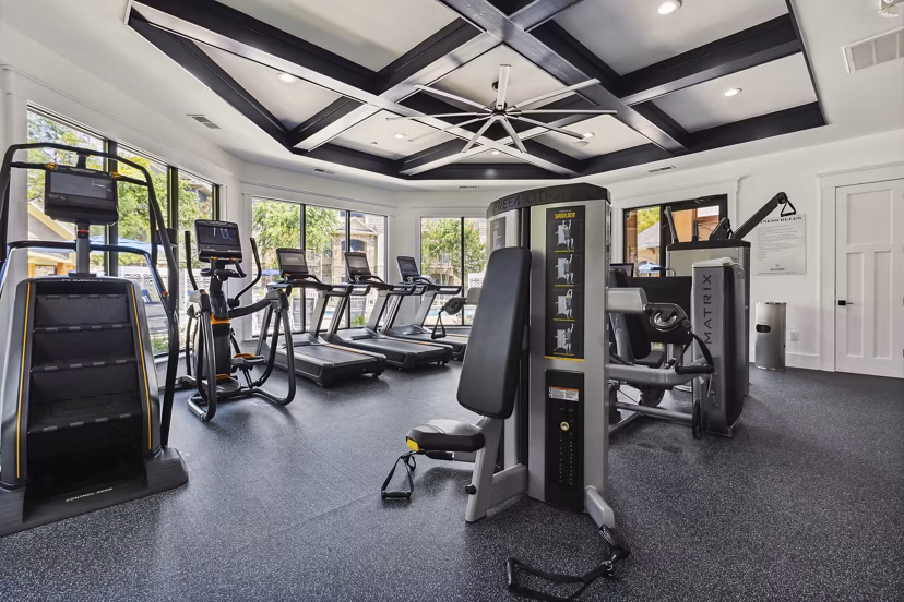 Modern fitness center with advanced equipment at The Banks at Rivergate Apartments