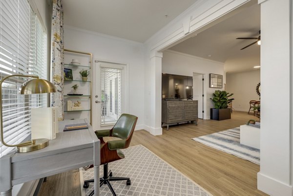 Home office featuring ergonomic desk and chair at The Banks at Rivergate Apartments luxury apartments