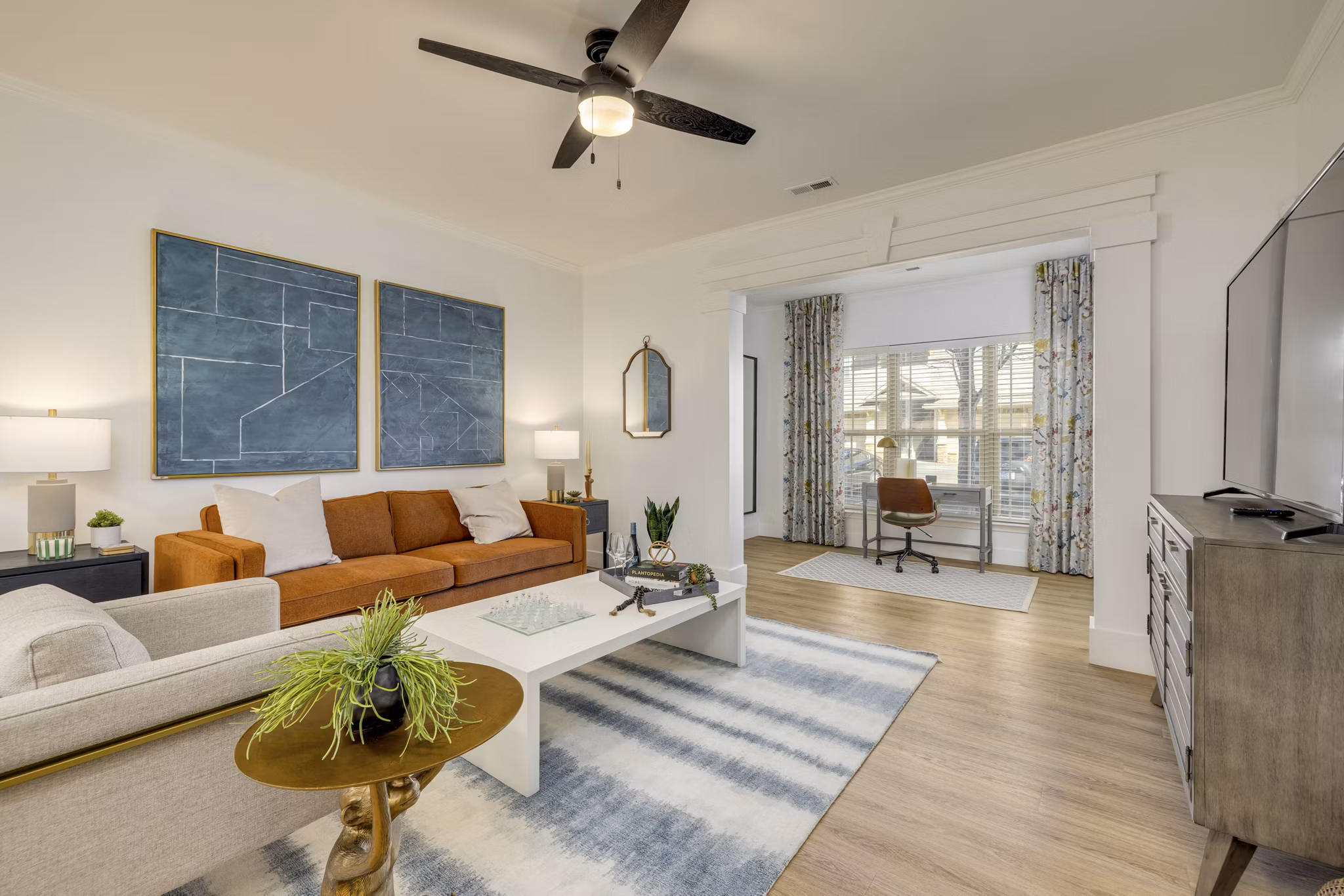 The Banks at Rivergate: Modern living room with sleek decor and natural light