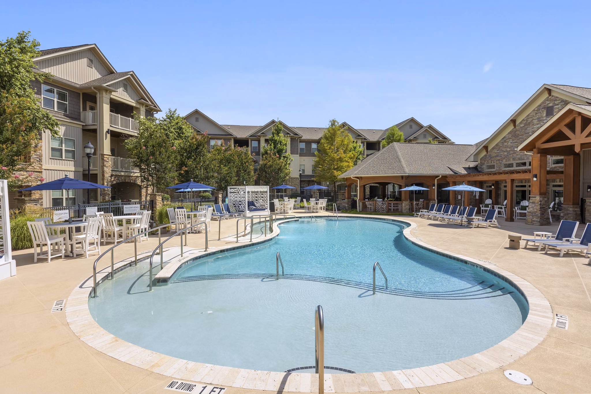 Riverside infinity pool at The Banks at Rivergate Apartments, ideal for leisure and relaxation
