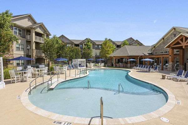 Riverside infinity pool at The Banks at Rivergate Apartments, ideal for leisure and relaxation