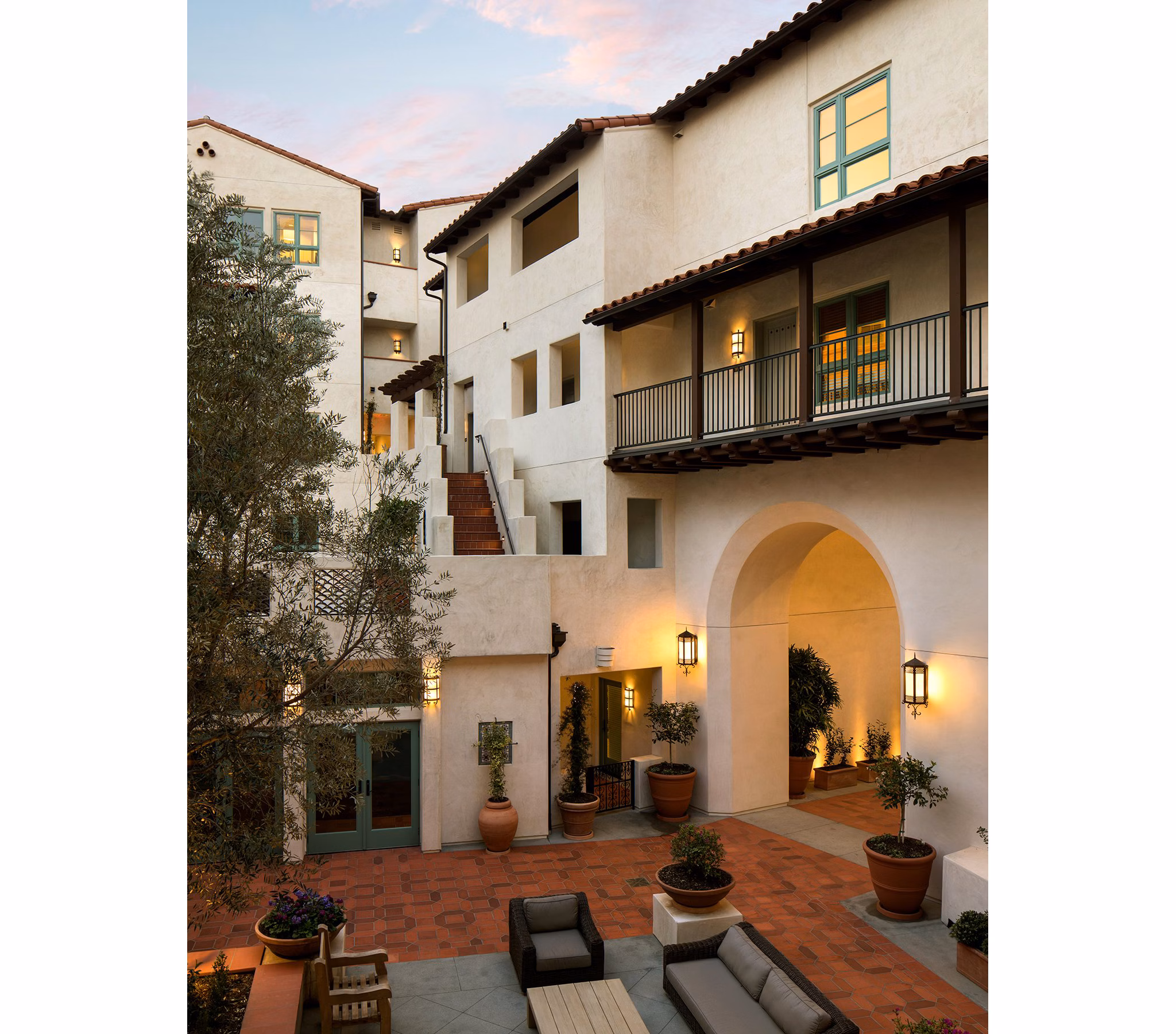 Clubhouse featuring stylish lounge seating and pool table at Andalucia Apartments luxury living community