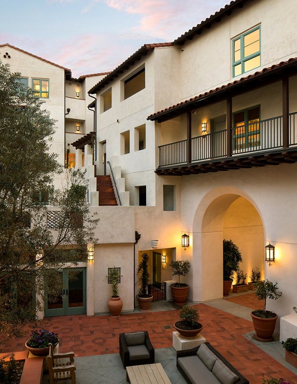 Clubhouse featuring stylish lounge seating and pool table at Andalucia Apartments luxury living community