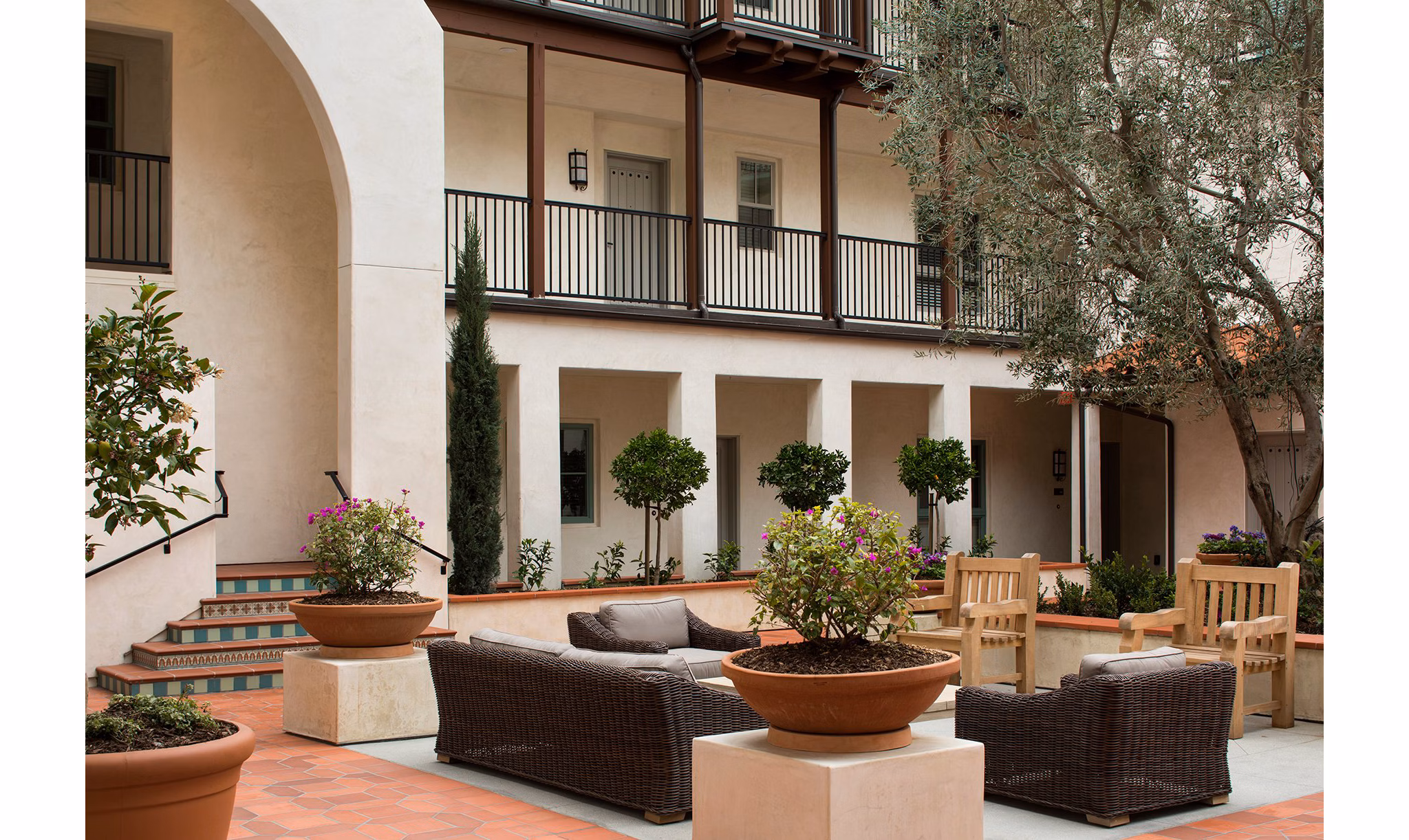 Clubhouse with modern design and elegant seating at Andalucia Apartments, offering luxury living in a vibrant community