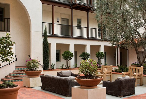 Clubhouse with modern design and elegant seating at Andalucia Apartments, offering luxury living in a vibrant community