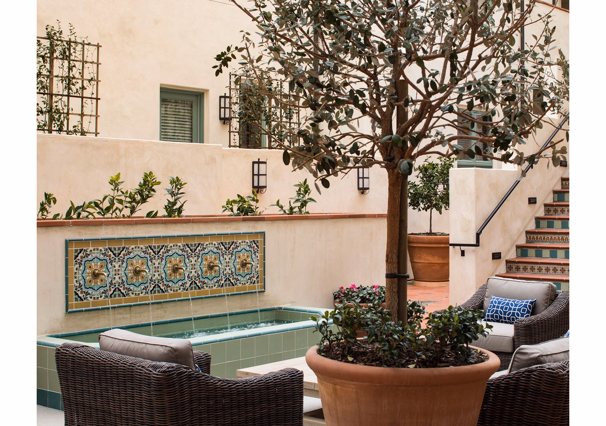 Modern clubhouse with lounge seating at Andalucia Apartments, a luxury apartment community