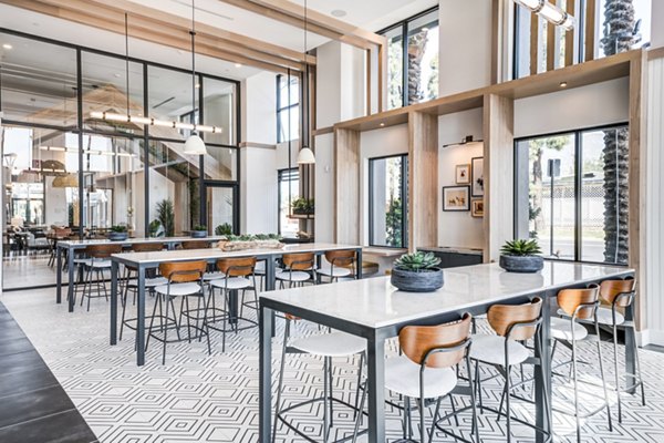Clubhouse with modern design at Esperanza at Duarte Station Apartments, offering luxury social spaces in a vibrant community