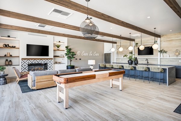 Modern clubhouse with stylish lounge seating at Esperanza at Duarte Station Apartments