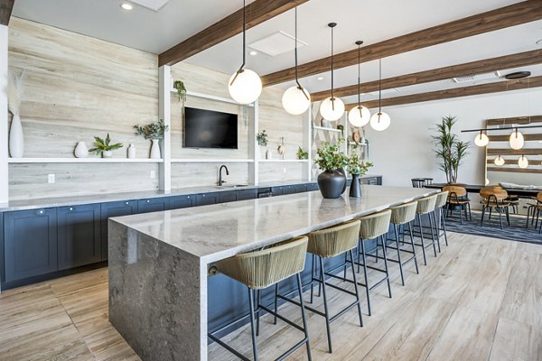 Clubhouse with modern design and spacious seating at Esperanza at Duarte Station Apartments