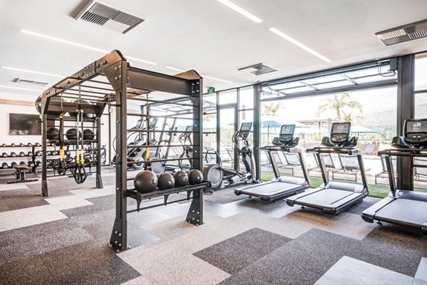 Fitness center with modern equipment at Esperanza at Duarte Station Apartments