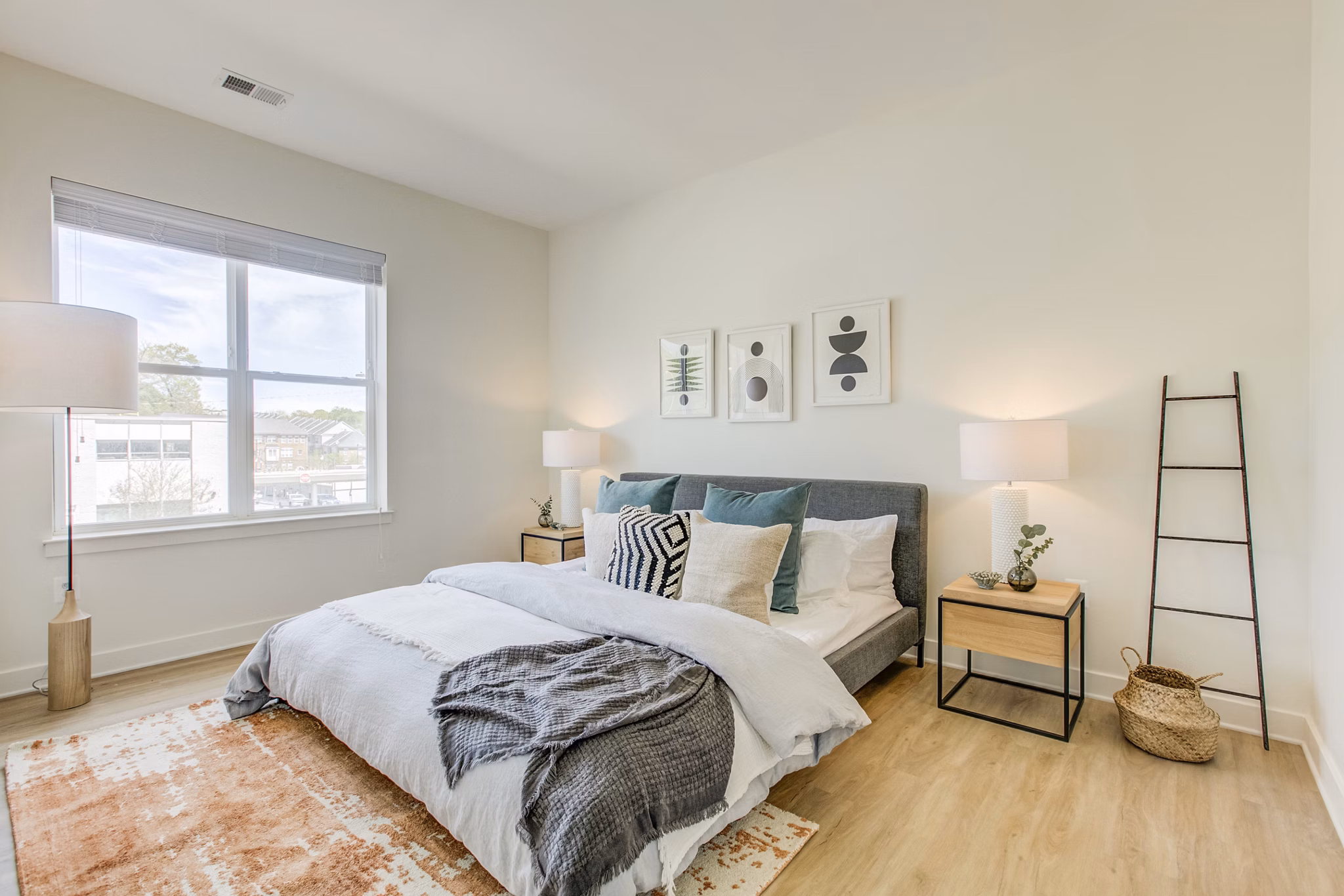 Bedroom featuring modern design and ample natural light at Centro Arlington Apartments