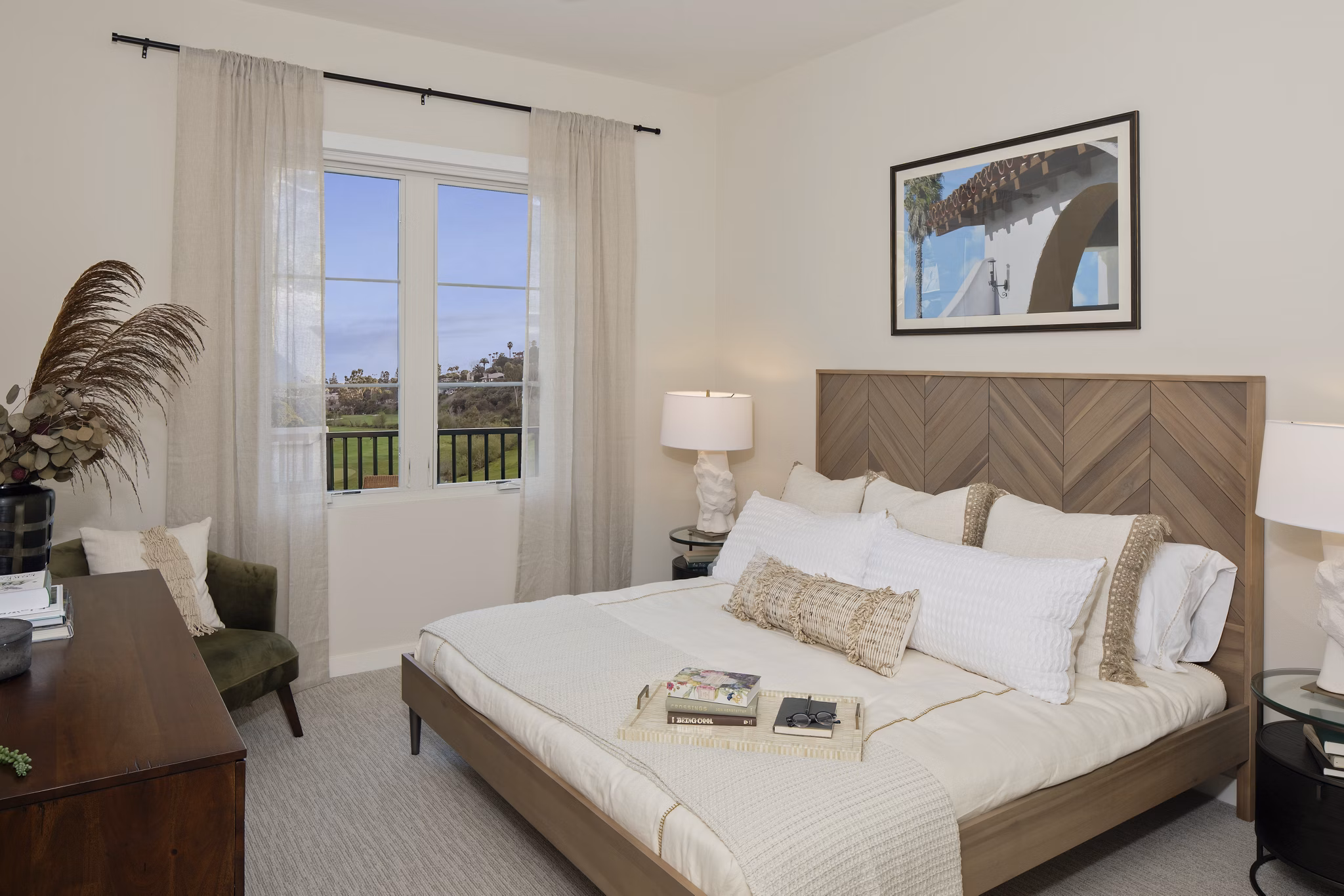Bedroom with modern decor and large windows at Everleigh San Clemente Apartments