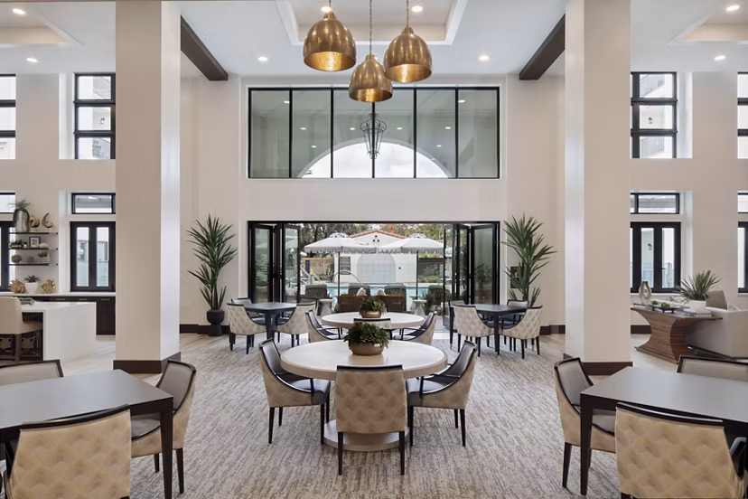 Everleigh San Clemente: Stylish clubhouse featuring modern dÃ©cor and comfortable seating in luxury apartments