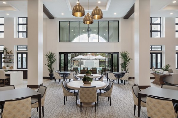 Everleigh San Clemente: Stylish clubhouse featuring modern dÃ©cor and comfortable seating in luxury apartments