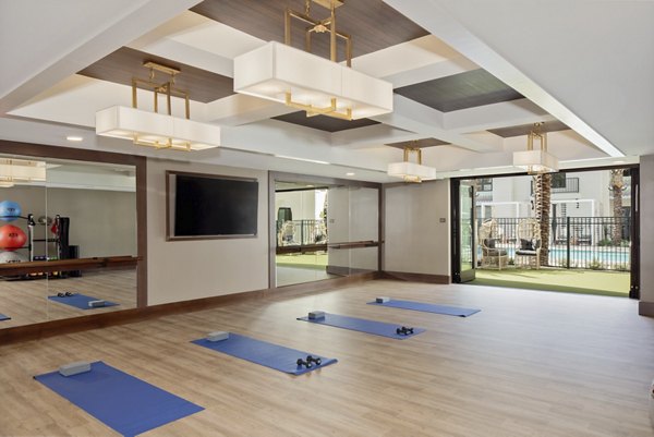 Yoga and spin studio with state-of-the-art equipment at Everleigh San Clemente Apartments
