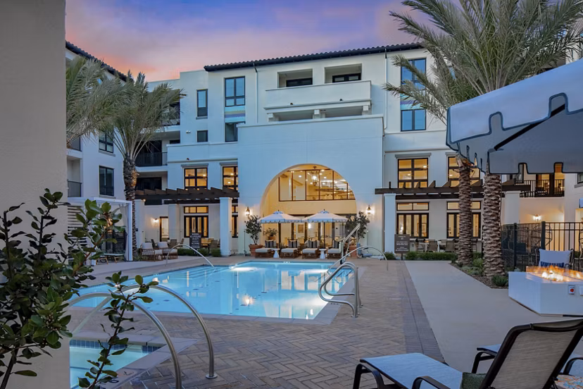 Resort-style pool with spacious sun deck at Everleigh San Clemente Apartments