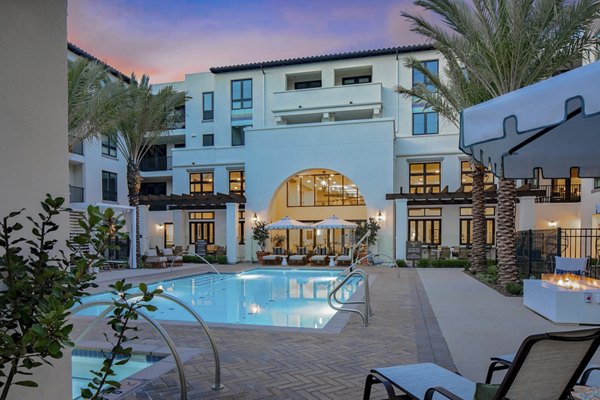 Resort-style pool with spacious sun deck at Everleigh San Clemente Apartments