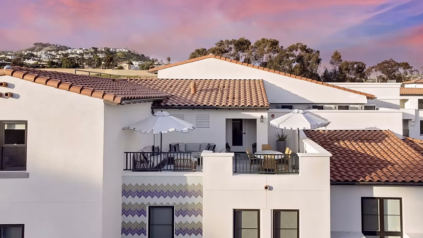 Coastal view from Everleigh San Clemente Apartments' balcony, showcasing luxurious seaside living