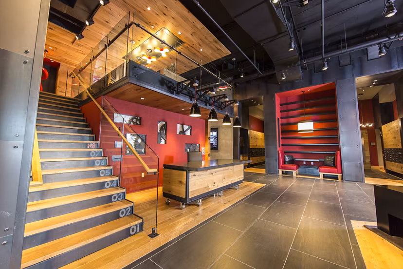 Modern clubhouse with cozy seating areas at Notch8 Apartments, a community-focused luxury property
