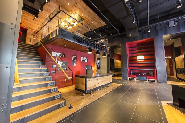 Modern clubhouse with cozy seating areas at Notch8 Apartments, a community-focused luxury property