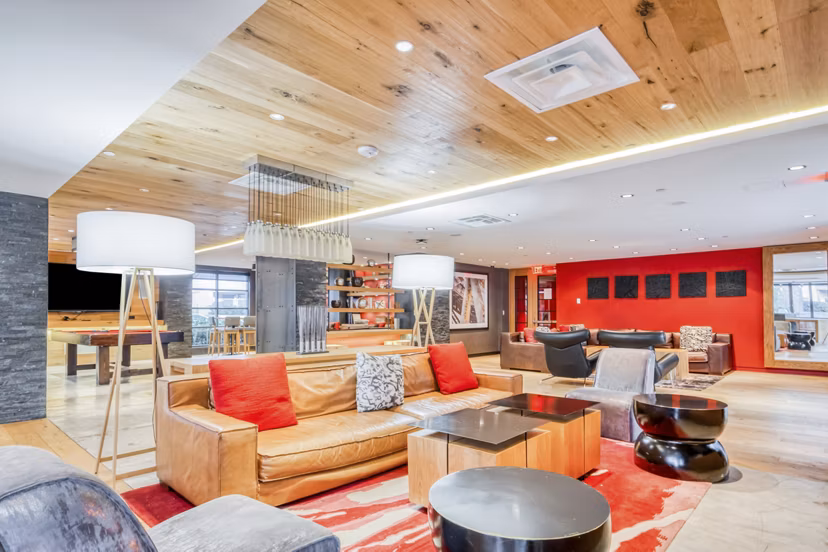 Modern clubhouse with stylish seating at Notch8 Apartments, perfect for social gatherings and community events