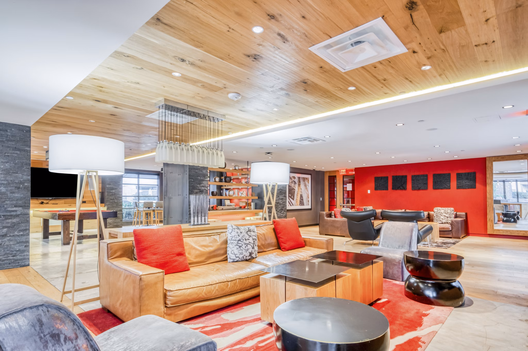 Modern clubhouse with stylish seating at Notch8 Apartments, perfect for social gatherings and community events