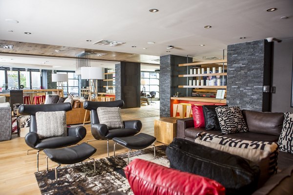 Clubhouse featuring modern design and comfortable seating at Notch8 Apartments luxury community