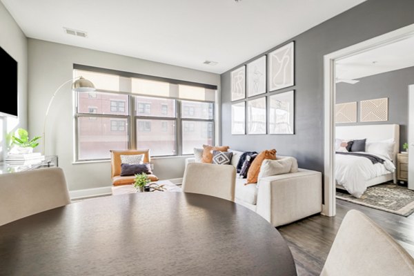 Dining area featuring modern decor and spacious seating at Notch8 Apartments