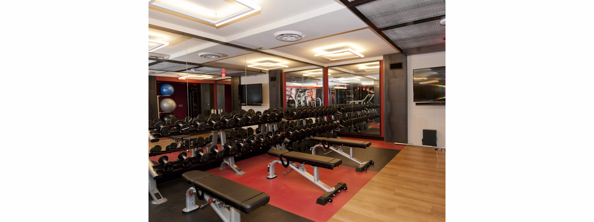 State-of-the-art fitness center with modern equipment at Notch8 Apartments for luxury living