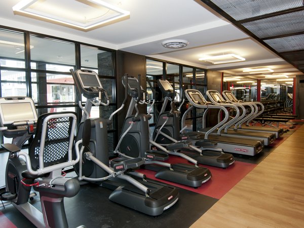 State-of-the-art fitness center with modern equipment at Notch8 Apartments