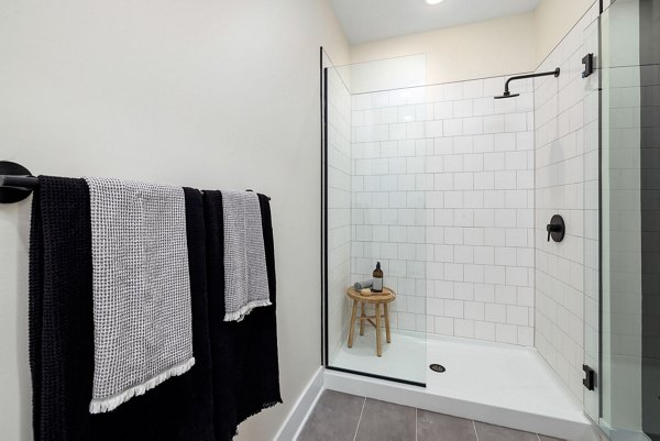Spacious bathroom with modern fixtures at The Signal Apartments